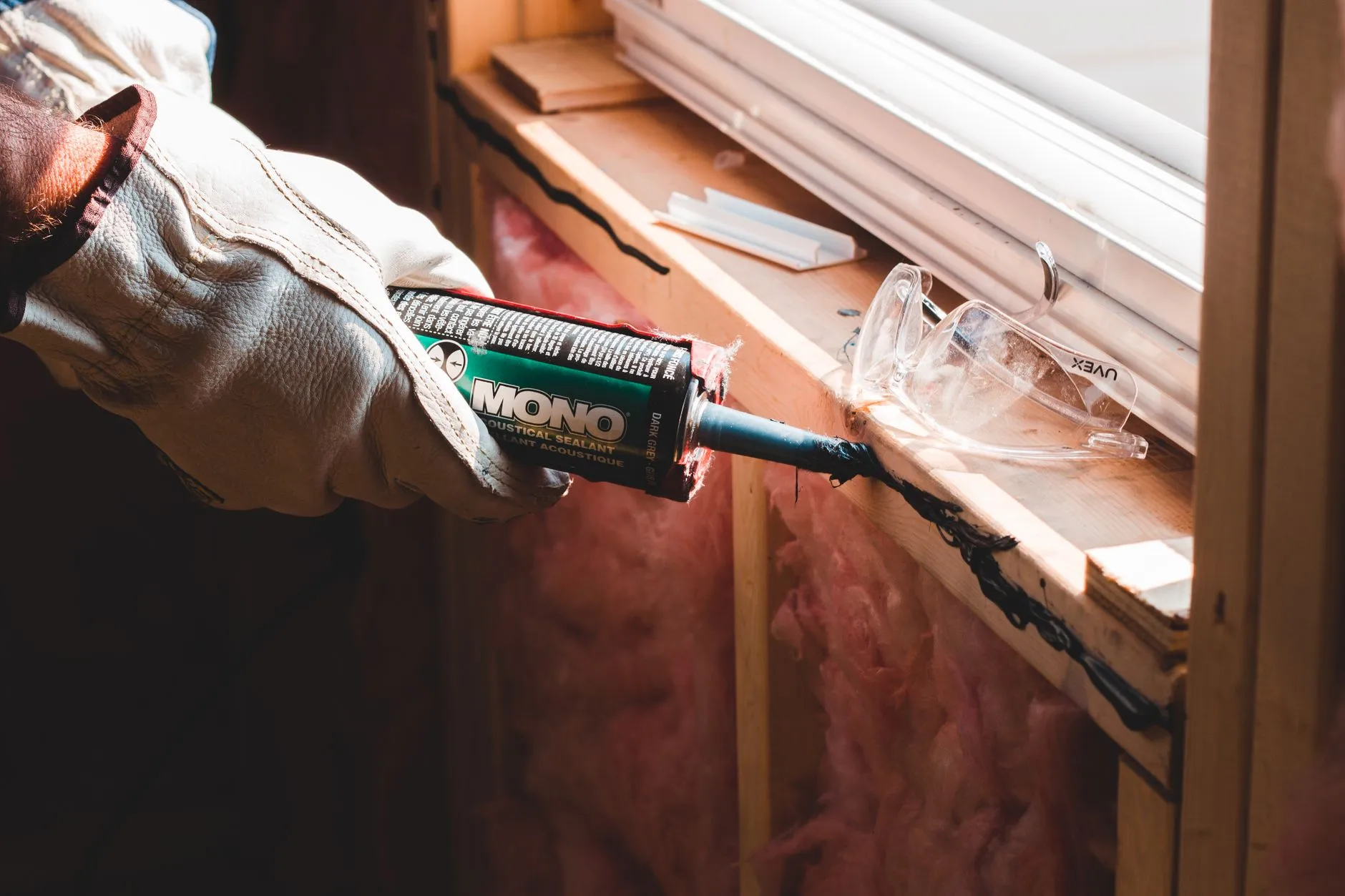 Applying caulk with a caulking gun