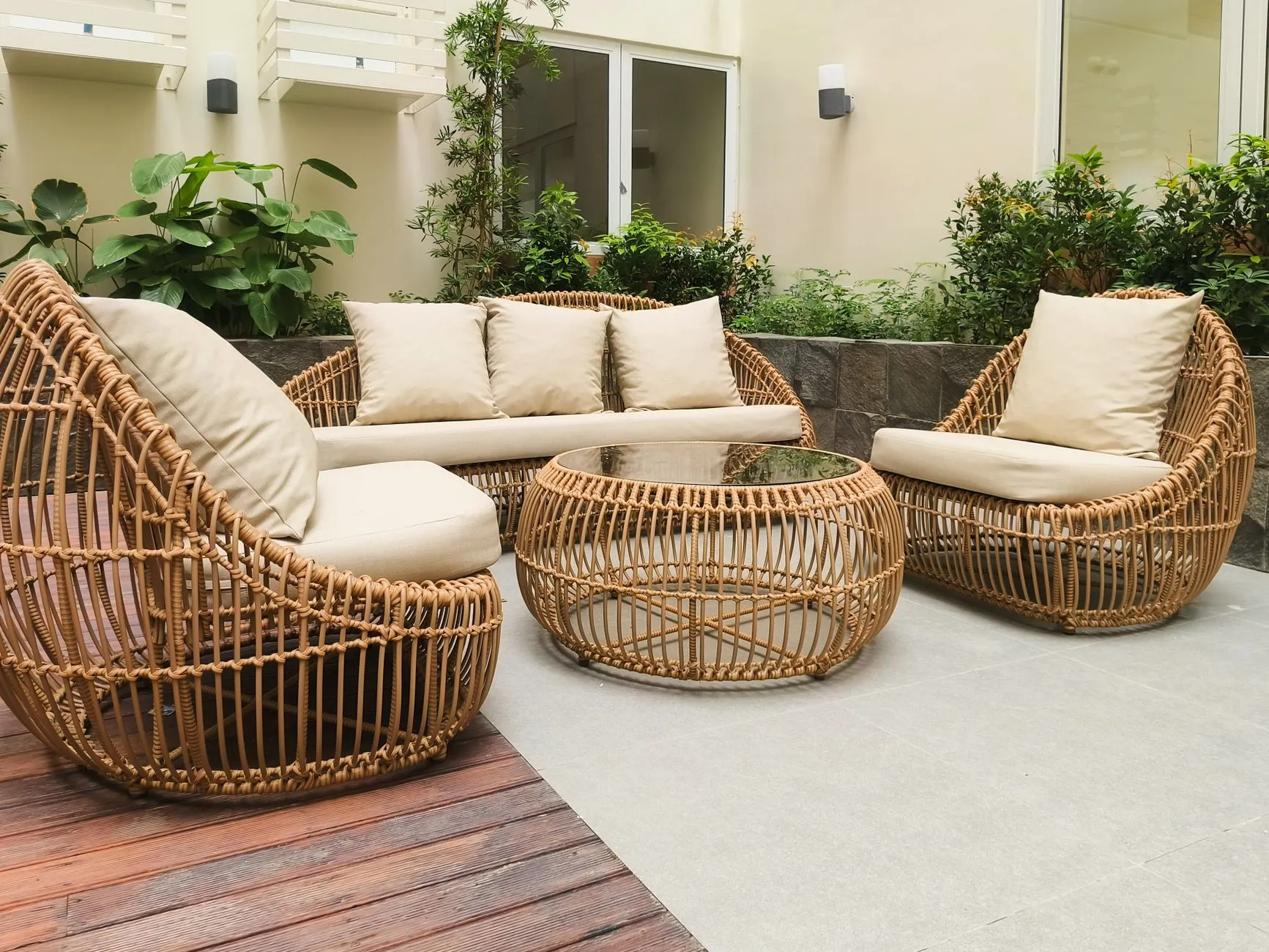 An outdoor chair with a cushion on a patio